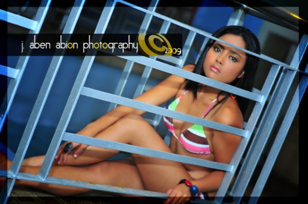 Female model photo shoot of ning llorin in GA tower