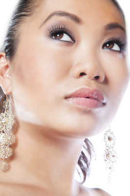 Female model photo shoot of Elegance Makeup