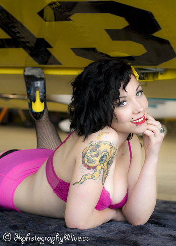 Female model photo shoot of Kelli Photography in Pin up