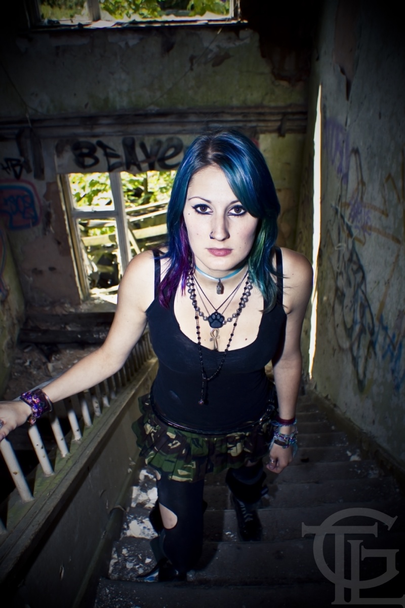 Female model photo shoot of Nella Morello by ThomGregory Photography in Abandoned Navey Base, Nr Bath