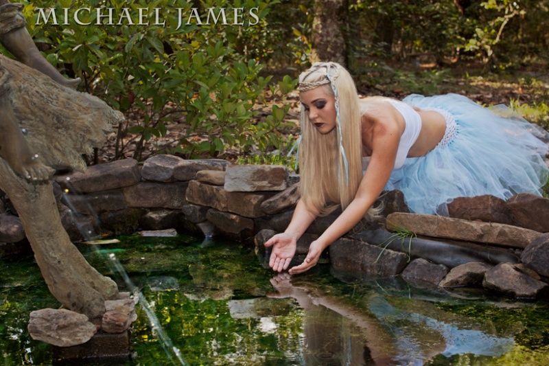 Female model photo shoot of Snow flake by Northwest FL Images in Eaden Gardens State Park, makeup by WithOut A Trace