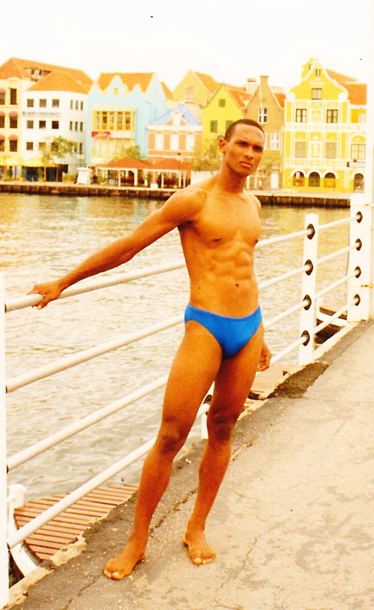 Male model photo shoot of curacaoman in Queen Emma Bridge, Curacao