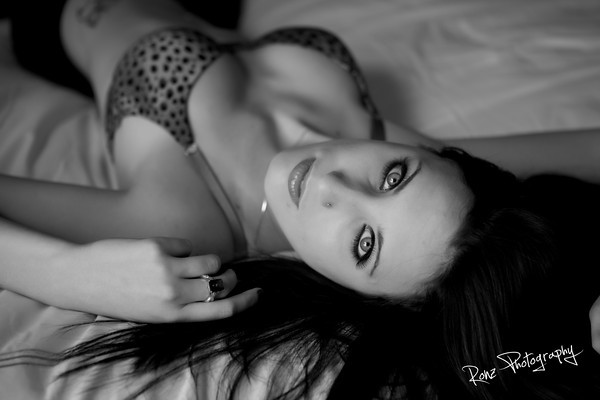 Female model photo shoot of Nikita Miles by Ronzphoto 