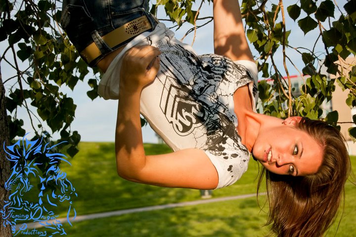 Female model photo shoot of brs1991 in in a tree in a park in denver