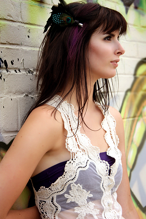 Female model photo shoot of swollen colours