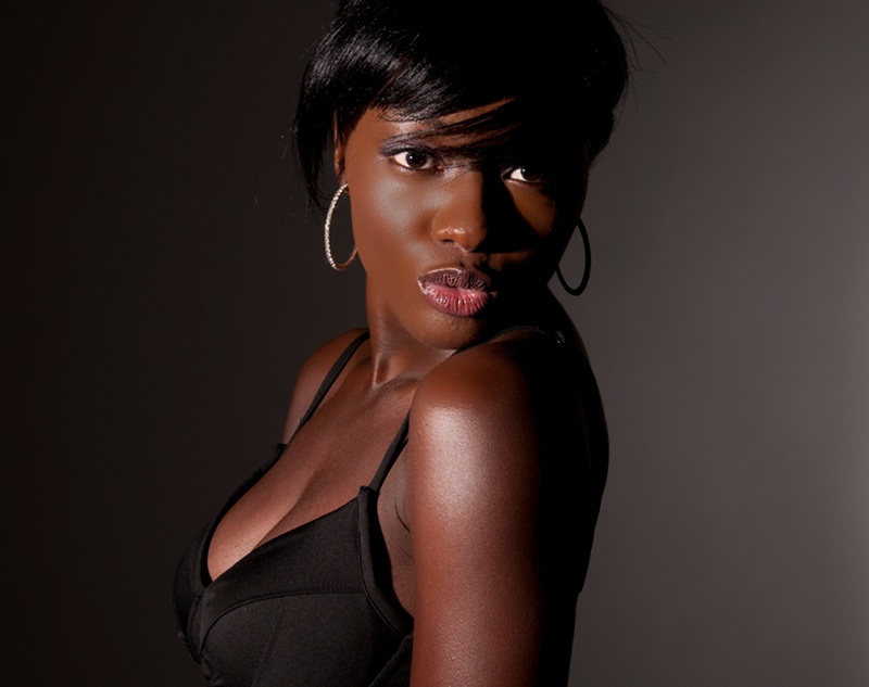 Female model photo shoot of Dwelley by Mike Will, makeup by GlamorousFacesbyTiff