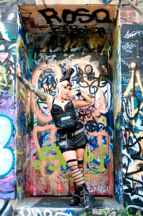 Female model photo shoot of RosaVenenosa in Toronto alleyways