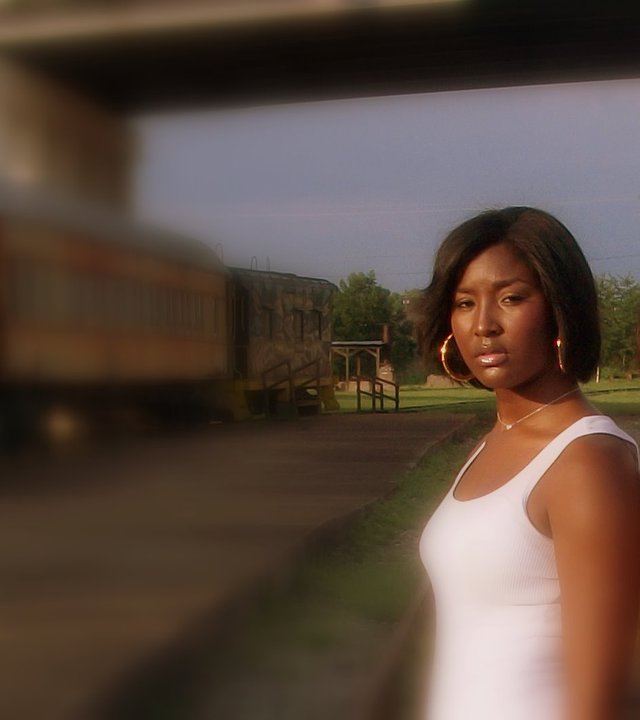 Female model photo shoot of Maronica Reuna in Meridian, MS train depot