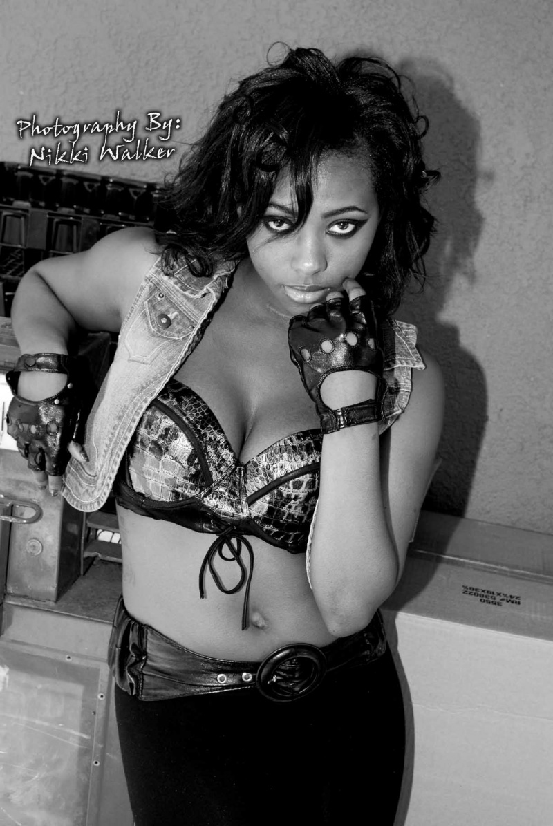 Female model photo shoot of Unique Carr by NikkiWalker Photography