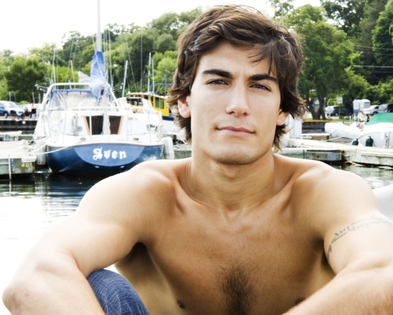 Male model photo shoot of EliasTheodorou in Hamilton Pier.