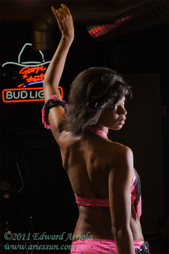 Female model photo shoot of Tyeshia S Harvey by Delightful Machinations in Elite Customs, Tucson, AZ