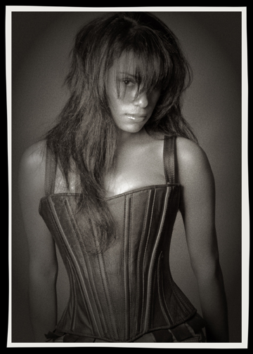 Female model photo shoot of Caged Art in Studio