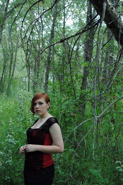 Female model photo shoot of Kayora Spicer in Forest of Okotoks Alberta