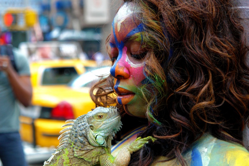 Female model photo shoot of Myoshi in Times Square, body painted by Andy Golub