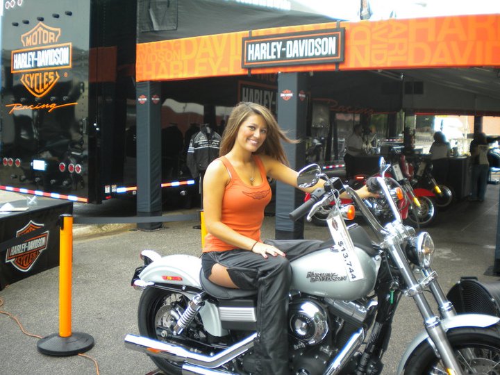 Female model photo shoot of LexiMarie in Harley Davidson Event