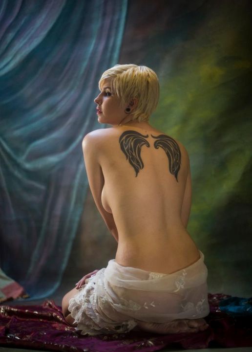 Female model photo shoot of Ms Scarlet Begonias by Edward Isais