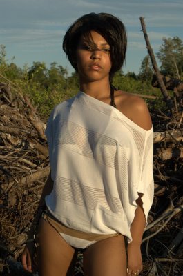 Female model photo shoot of Kishara  in An area where trees are destroyed to build houses.