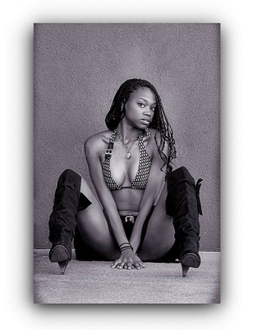 Female model photo shoot of LaShaundra  Boykin by Side Street Studio in St. Joe Michigan