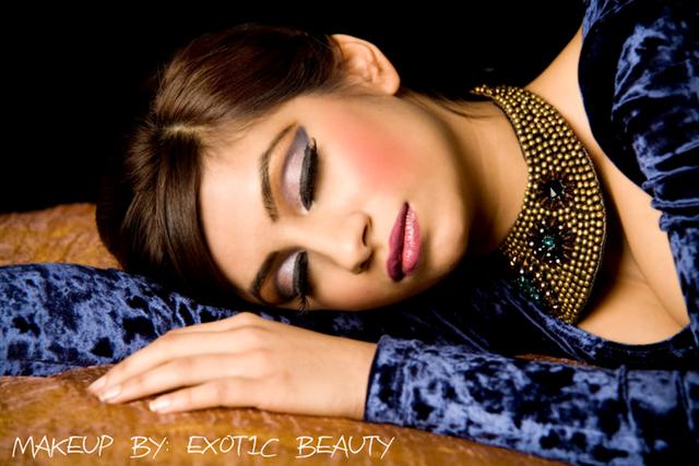 Female model photo shoot of exotic beauty make-up