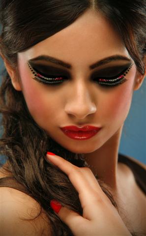 Female model photo shoot of exotic beauty make-up
