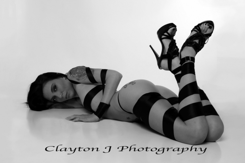 Male and Female model photo shoot of Clayton Jackson and Brandy Norton in Hawaii Studio