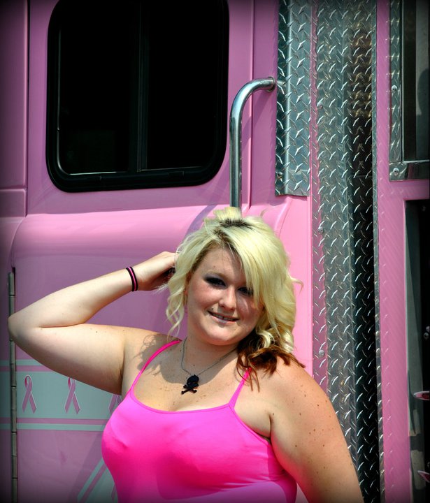 Female model photo shoot of Tee Tee Doll in North Little Rock Fire Dept.