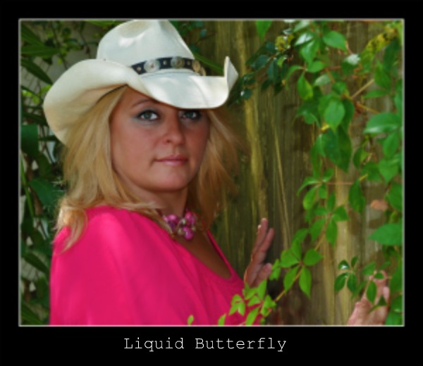 Female model photo shoot of Liquid Butterfly  in Apopka, Florida