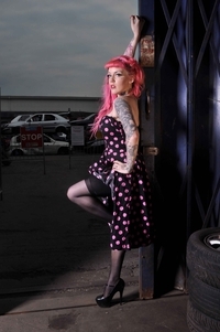 Female model photo shoot of sonny johnson in scrapyard gy