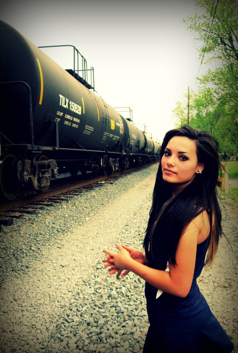 Female model photo shoot of china_chism in train park
