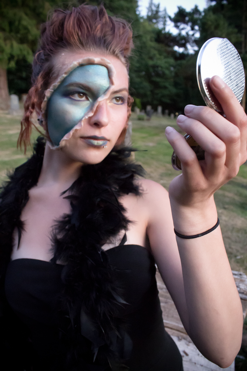 Female model photo shoot of tiltedcanvas in Bay View Cemetery, Bellingham, WA, makeup by Ellen SD