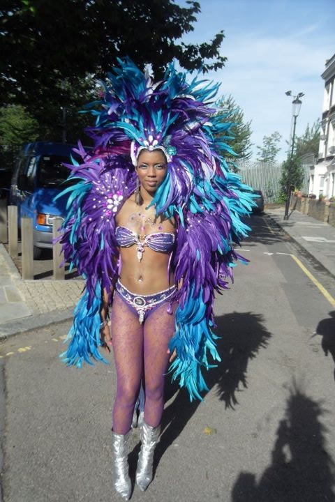 Female model photo shoot of FrenchyCaribbean in Notting Hill Carnival 2011
