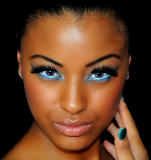 Female model photo shoot of Makeup By Summer Scott