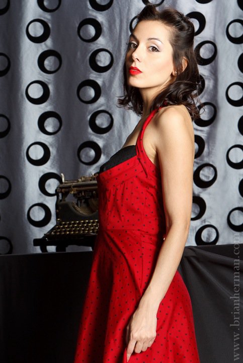 Female model photo shoot of Carabella Makeup Artist