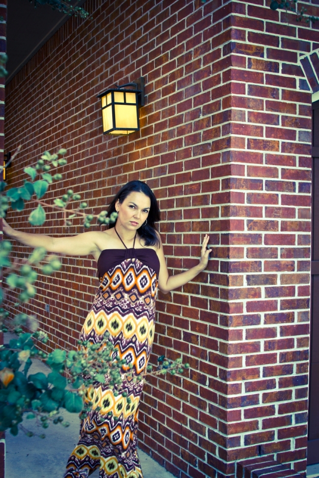 Female model photo shoot of Eva Wilson by DescryStudios in Downtown Pensacola, Florida.