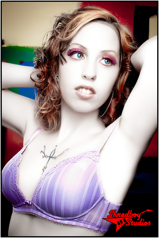 Female model photo shoot of purple kitty by Scott Peloquin Photography