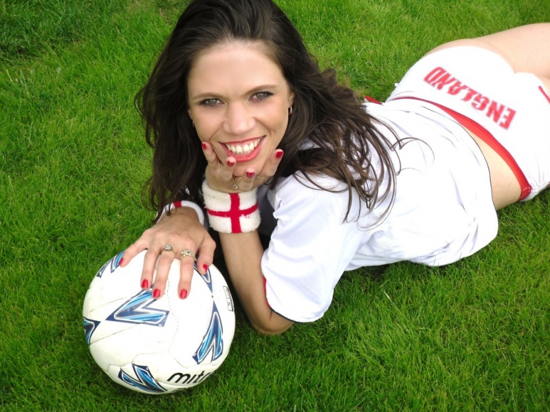 Female model photo shoot of Esther Adams in witham town football club