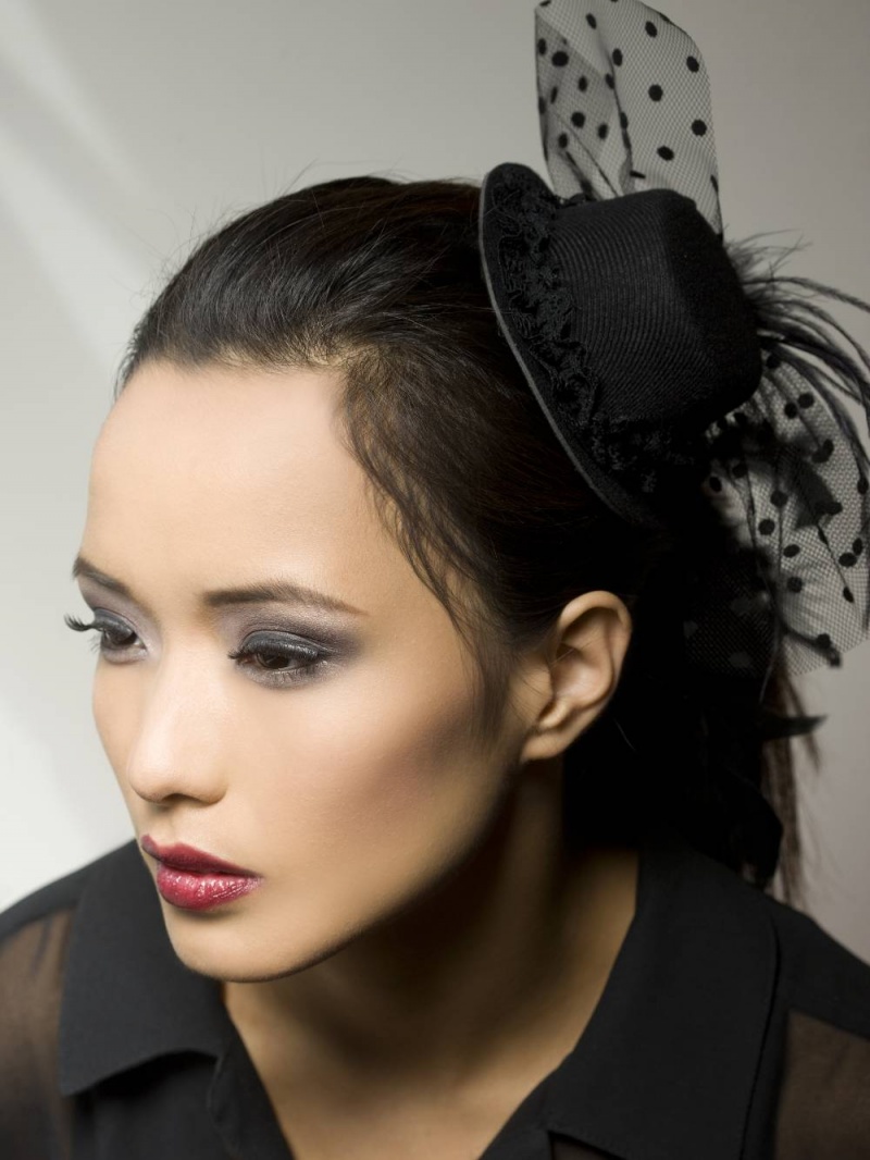Female model photo shoot of VAL Makeup Art