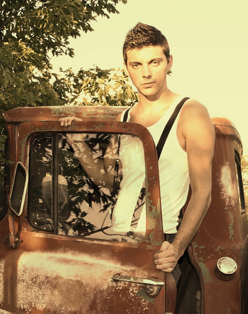 Male model photo shoot of Eric James Diemel in Junk yard
