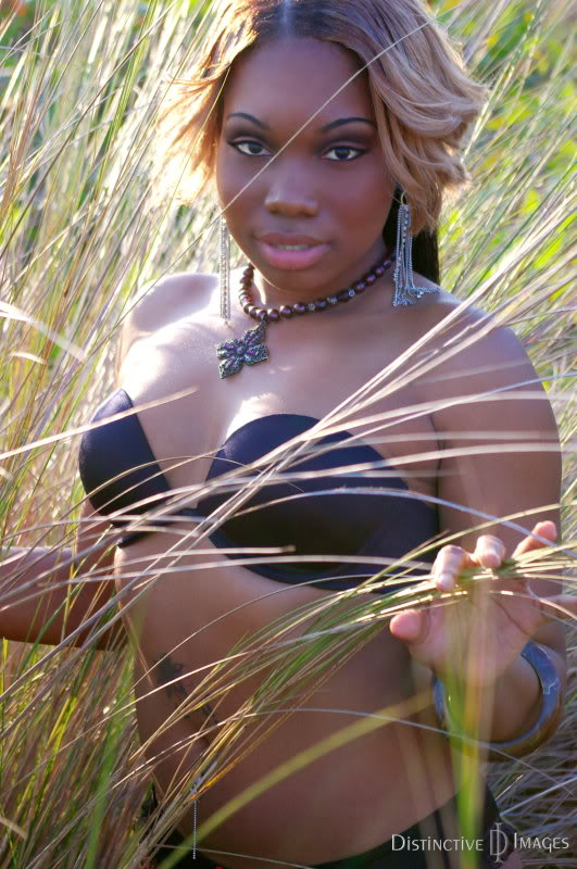 Female model photo shoot of The Black Erika Kane