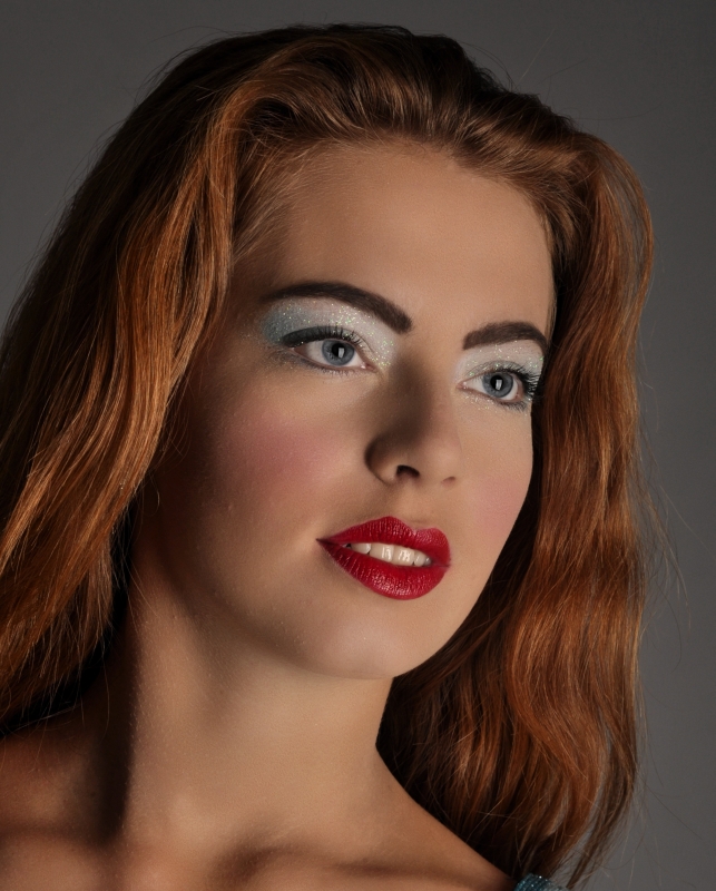 Female model photo shoot of Colourful Heart Makeup by MKPhoto