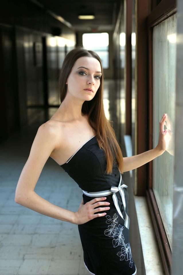 Female model photo shoot of Britt Haze by Aaron Geller in Downtown Toledo, Ohio
