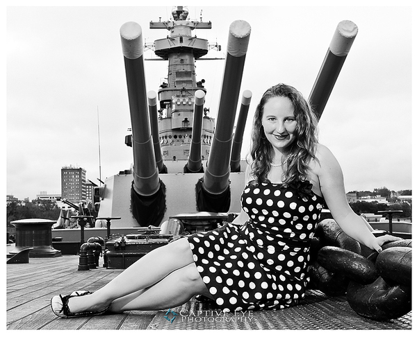 Female model photo shoot of Kari Sanderlin by Captive Eye Photography in USS North Carolina, makeup by Contessa Black