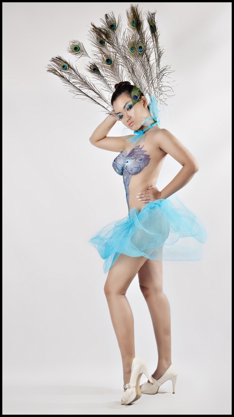 Female model photo shoot of Nath Blue by SLRfotos in Singapore, makeup by winnie