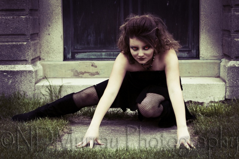 Female model photo shoot of 3 Muses Photography in Resurrection Cemetery