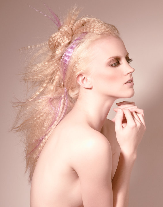 Female model photo shoot of Amrel Artistry in LBC, hair styled by Nico Scegiel 
