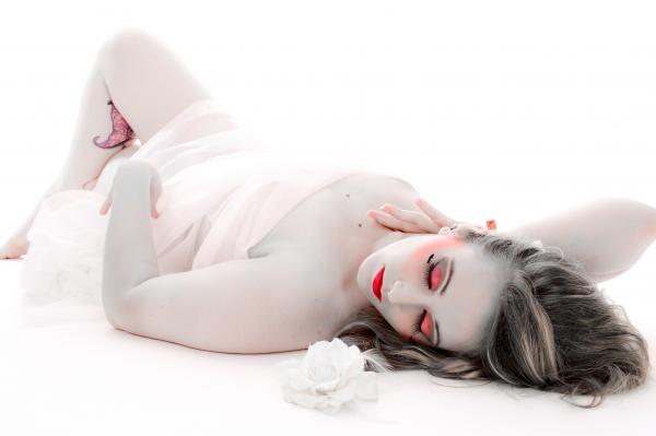 Female model photo shoot of Censored Pain in Studio