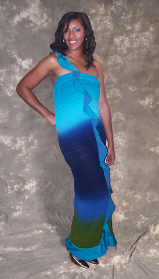 Female model photo shoot of Lotus Couture Designs