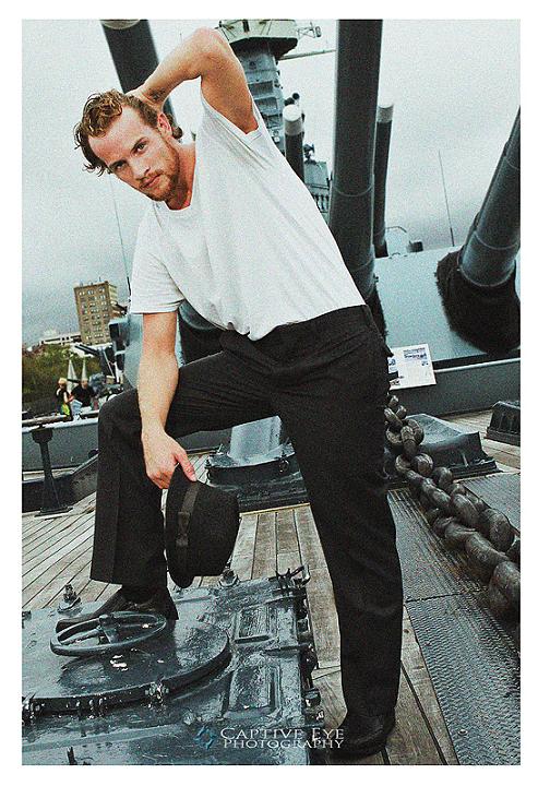 Male model photo shoot of Ryan A Merrick in Wilmington, NC on the USS North Carolina