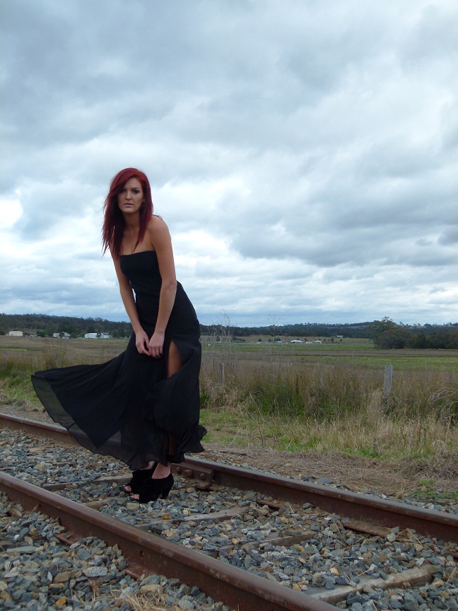 Female model photo shoot of Natalie R Hughes in Old railway tracks