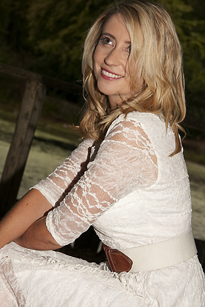 Female model photo shoot of Chloe Singer by FASHION AND BEAUTY in Kent countryside, makeup by Alex Whelpton MUA